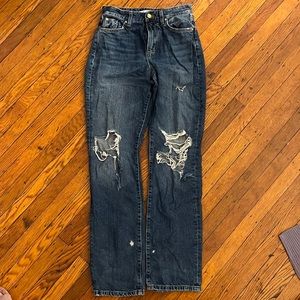 Zara ripped high waisted jeans. Size 2, but can fit size 3/4 as well.
